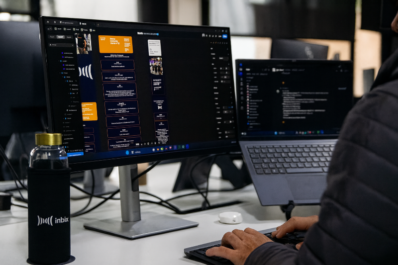 Futuristic workspace with multiple transparent screens showing AI marketing tools and automation charts